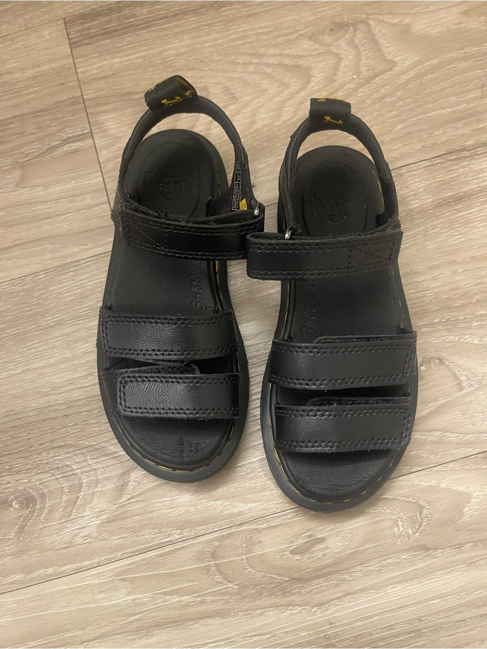 Dr. Martens Kids Black Sandals with Yellow Stitching